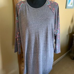 LulaRoe Randy top with neon Aztec print.